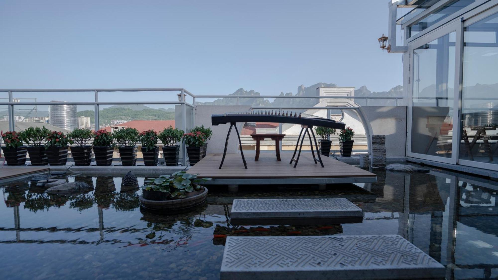 Patio Spring Holiday Inn -- Free Round Trip Pick-Up Service --Panoramic View Of Tianmen Mount 張家界市 エクステリア 写真