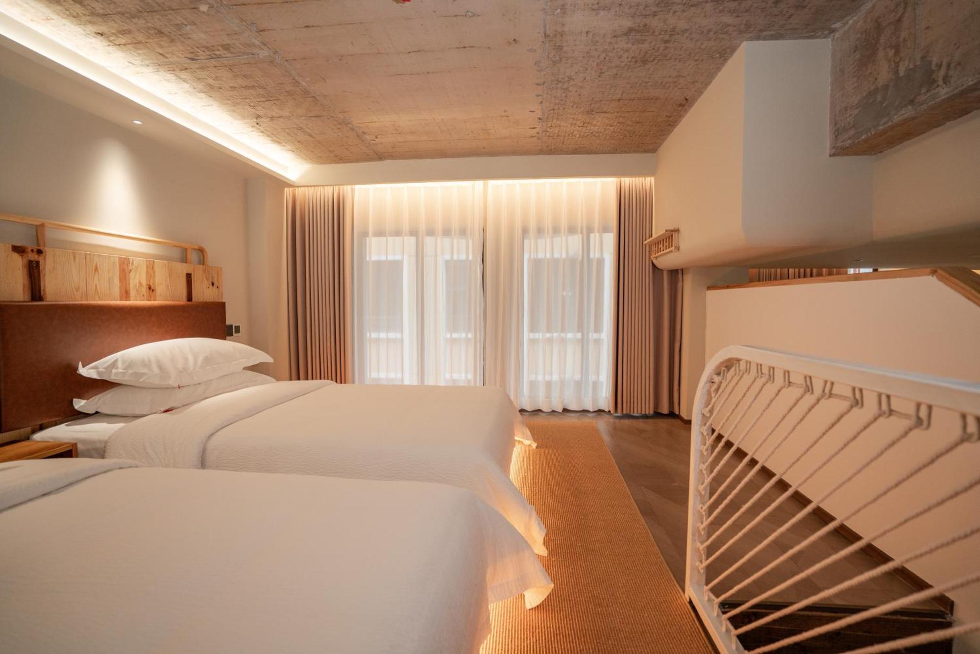 Patio Spring Holiday Inn -- Free Round Trip Pick-Up Service --Panoramic View Of Tianmen Mount 張家界市 部屋 写真