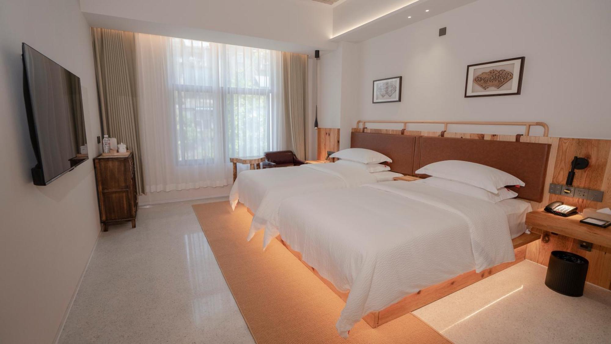 Patio Spring Holiday Inn -- Free Round Trip Pick-Up Service --Panoramic View Of Tianmen Mount 張家界市 エクステリア 写真