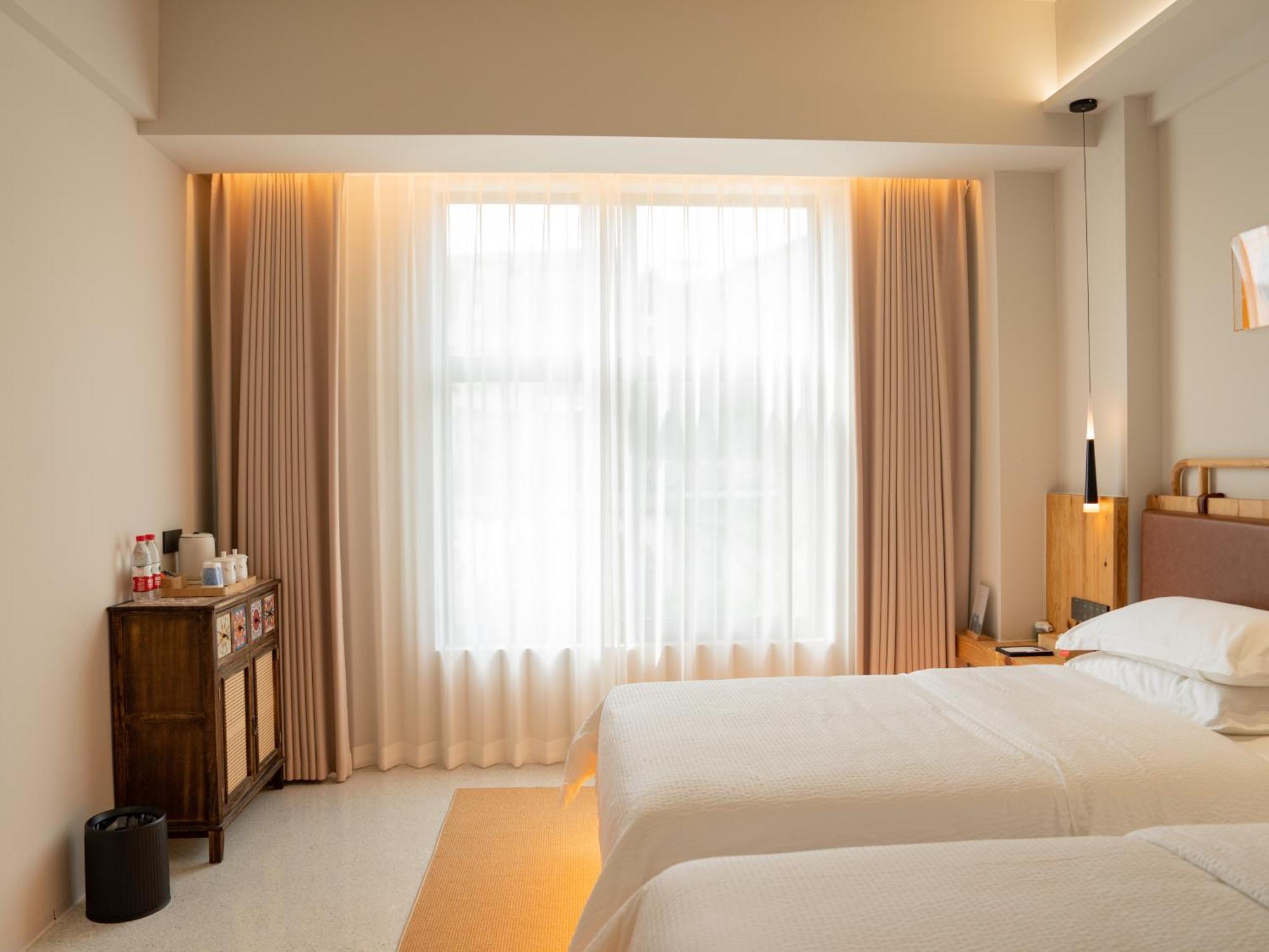 Patio Spring Holiday Inn -- Free Round Trip Pick-Up Service --Panoramic View Of Tianmen Mount 張家界市 エクステリア 写真